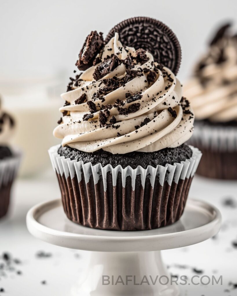 Moist chocolate Oreo cupcakes with rich buttercream frosting and Oreo crumbs on top