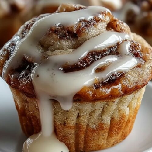 Cinnamon roll muffins with buttery cinnamon swirl and vanilla glaze