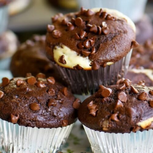 Homemade chocolate chip muffins with rich cheesecake filling