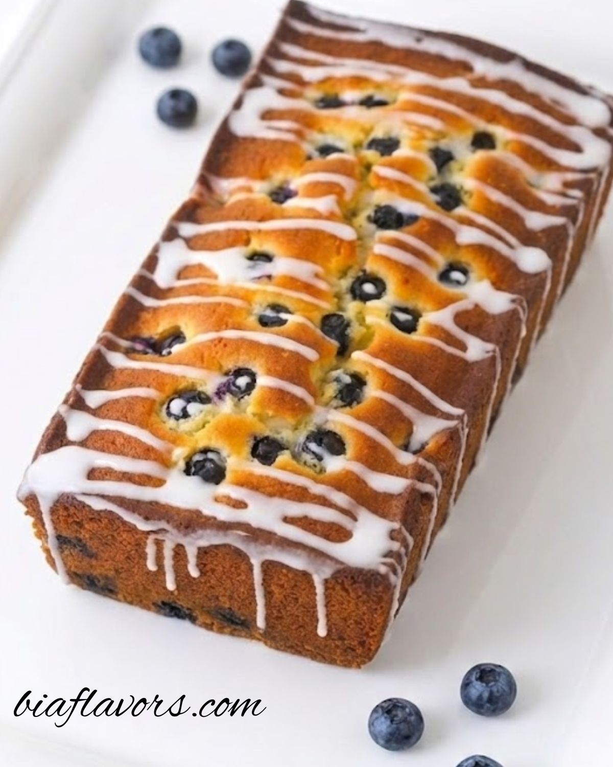 Homemade lemon blueberry bread on a cooling rack