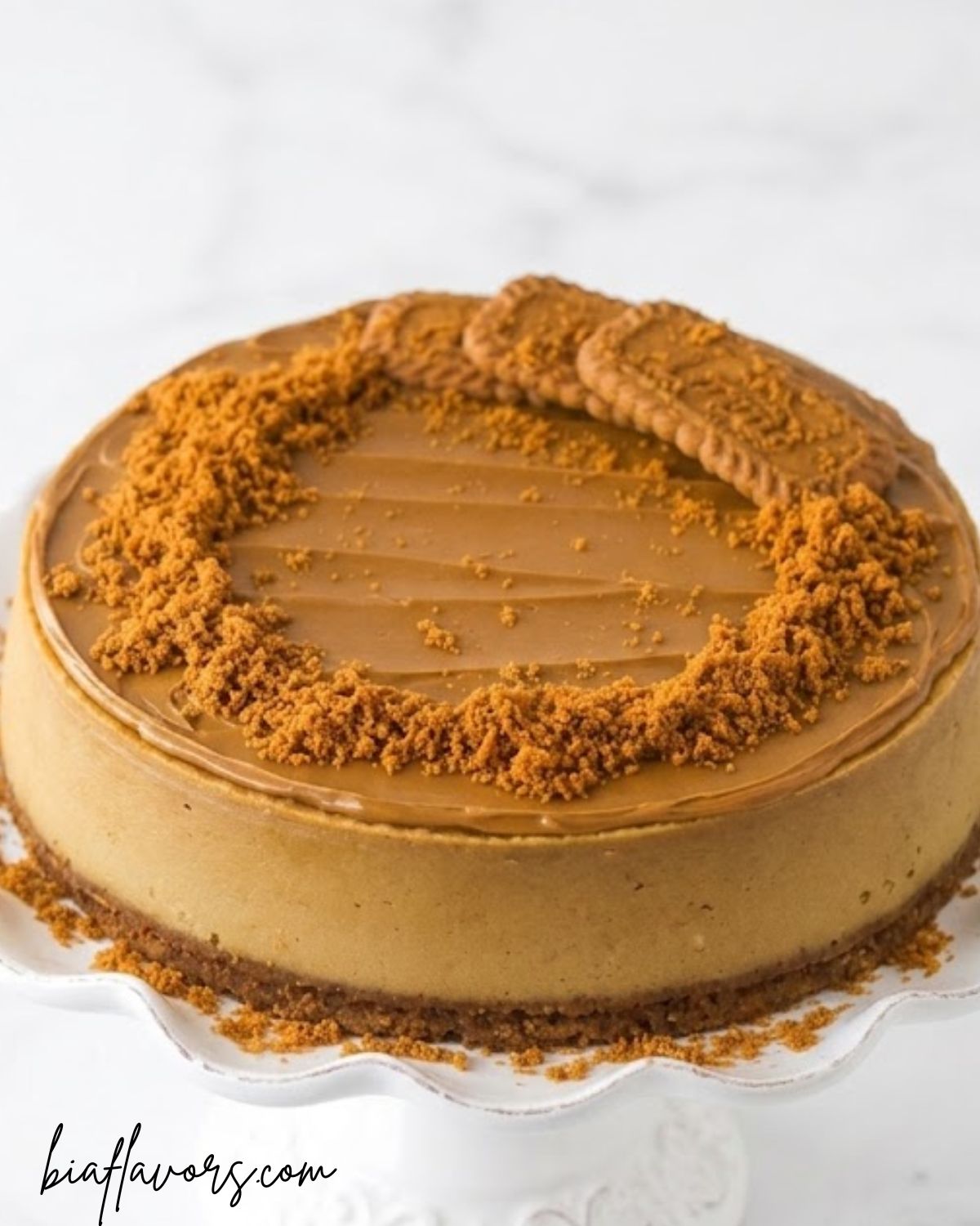 creamy Biscoff cheesecake with smooth cookie butter topping