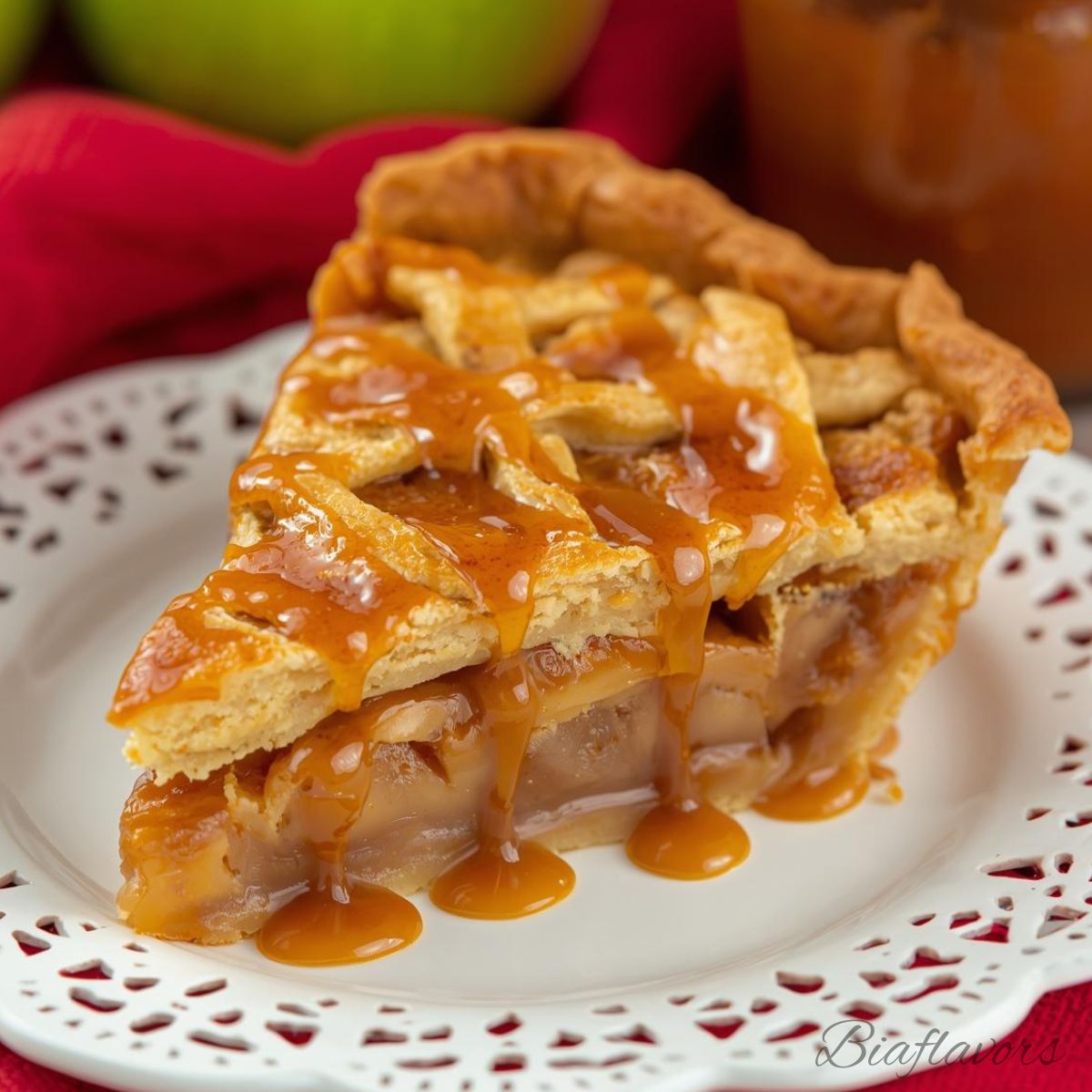 slice of caramel apple pie showing gooey apple and caramel layers