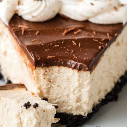 slice of espresso cheesecake showing creamy layers and chocolate ganache